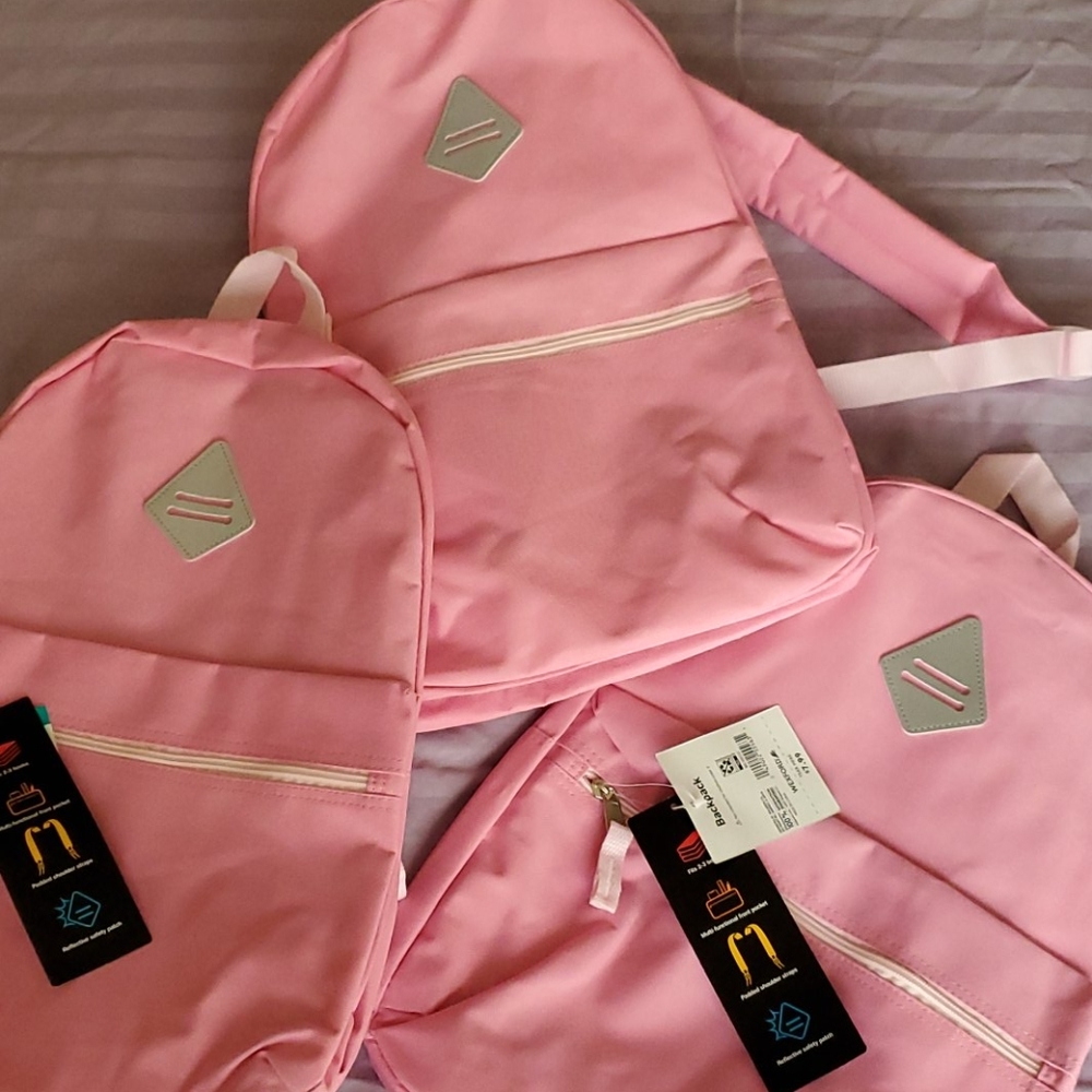 3 NEW pink backpacks